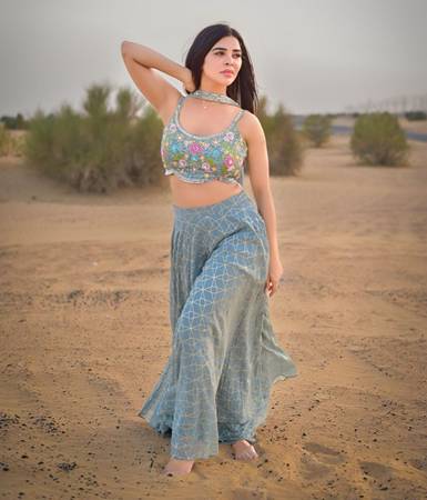 Actress  Nivedita Chandel Showcases Beauty, Grace, And Desert Vibes In A Stunning Dubai Photoshoot